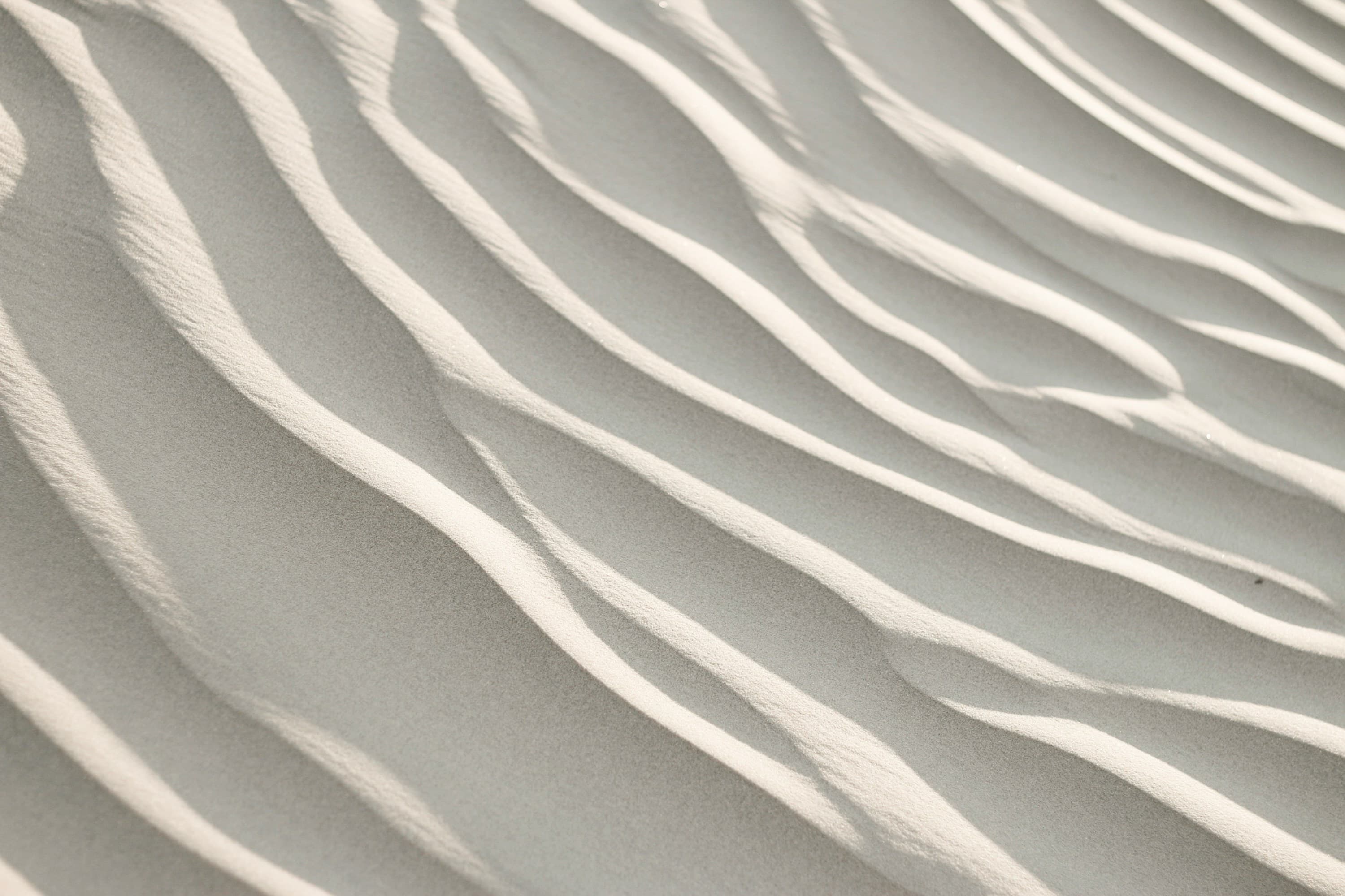Close-up sand waves representing careful portfolio management