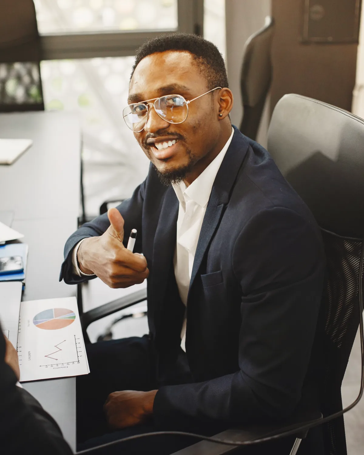 ERAD Investment advisor smiling during a client meeting